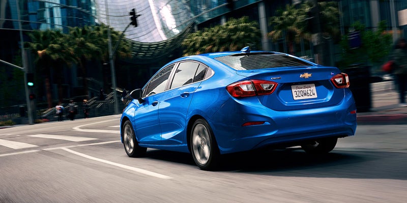 Chevy Cruze driving on the road - Bob Jass Chevrolet in Elburn IL